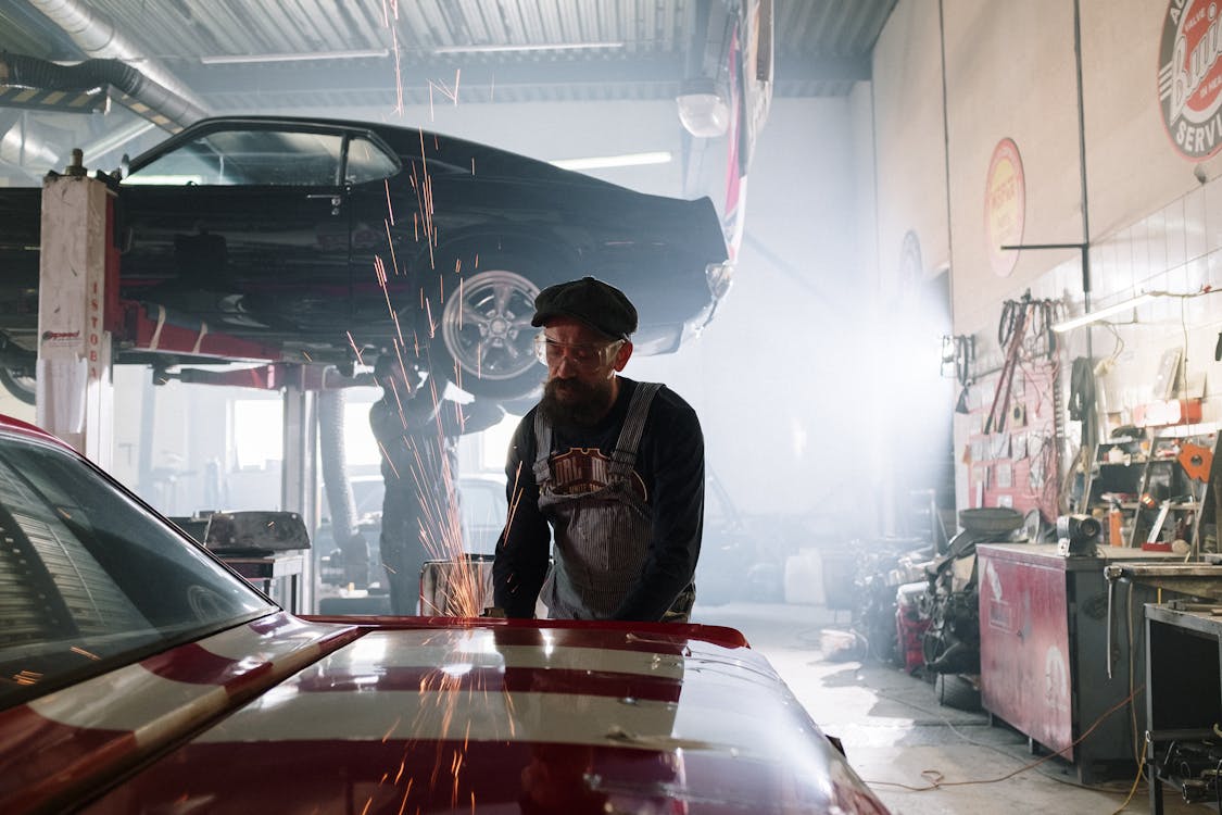Car Battery Service Clarksville IN & Louisville KY — technician at work in the Pinnacle Motorsports workshop