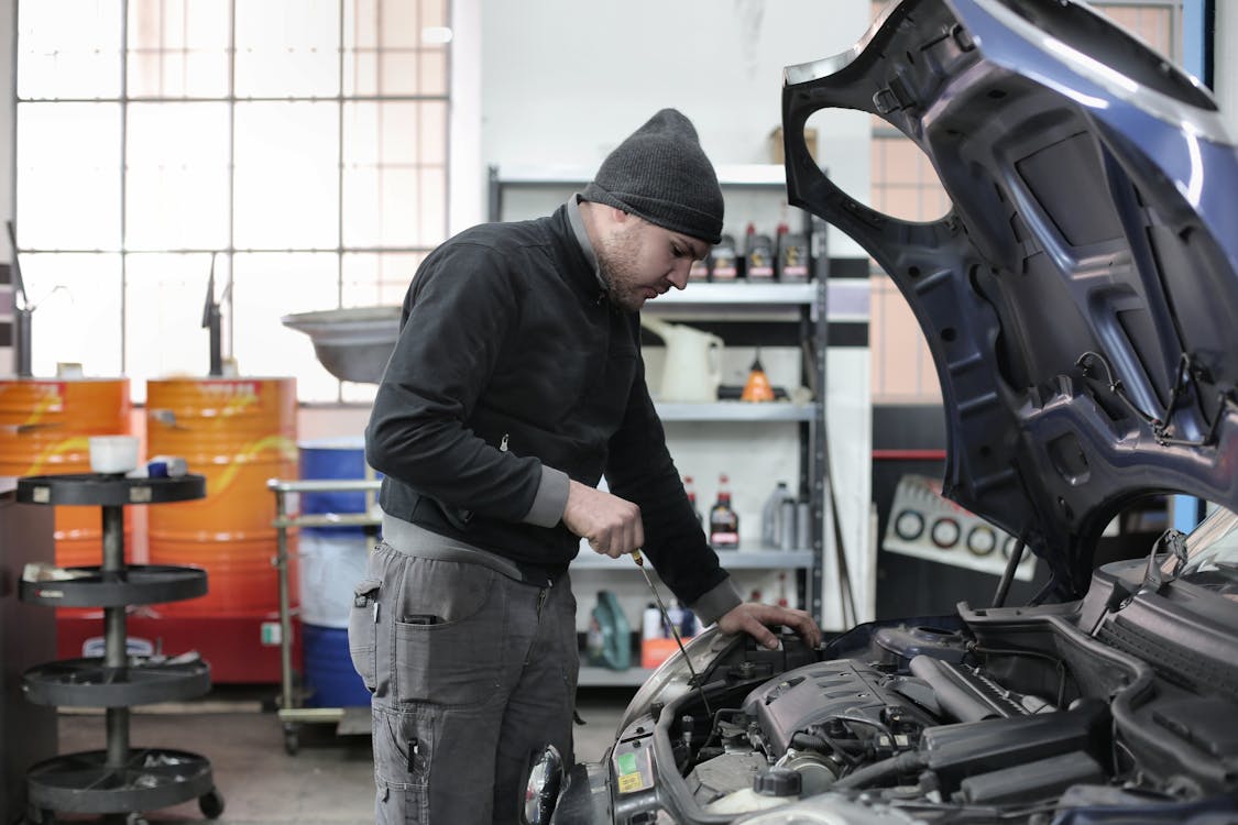Cooling System & Radiator Repair Clarksville IN — technician at work in the Pinnacle Motorsports workshop